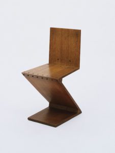 Zig-Zag chair, 1939. Oak and brass.