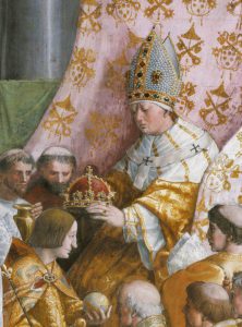 The Pope placing the crown onto Charlemagne's head as he kneels in front of him. Work by the school of Raphael