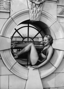 A young woman in a two-piece bathing suit, 1937