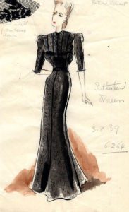 Hardy Amies evening gown for Miss Sutherland. Black lace wide-shouldered evening gown.