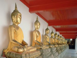 Buddhas, Wat Pho, Bangkok, Thailand. E&E Image Library, London, Great Britain