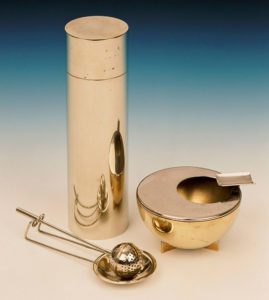 Wilhelm Wagenfeld, A Bauhaus ash-tray and tea-caddy with a tea infuser and drop-pan. Christie's Images Limited