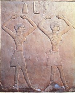 Two dancers in a raised arms pose Limestone relief, tomb of Nekheptk, Egypt