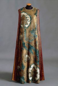 Fashion, Italy, 20th century. Medieval theatre costume in blue and gold print silk velvet, around 1912. Mariano Fortuny manufacture, Venice. - DA55127
