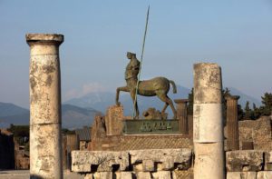 Centaur statue, 1994, by Igor Mitoraj, on the Forum of Pompeii, Archaeological Park of Pompeii, Campania, Italy. - MC23221