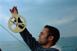 Astrolabe being used by a sailor