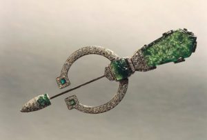 Cartier’s gold and platinum fibula brooch set with emeralds and diamonds 1924