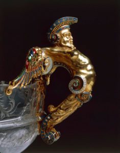 Goldsmith's art, Italy, 16th century. Rock crystal and enamelled gold cup. Height cm. 19. Milanese manufacture. Detail: enamelled gold handle in shape of a winged figure. - DA54261