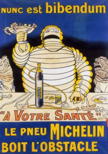 litografia a colori poster Michelin con l'omino michelin (Bibendum) a una tavola con un bicchiere di chiodi e vetri rotti