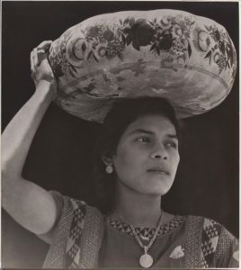 black and white woman with bundle on head santo domingo