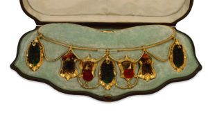 Gold necklace set with the heads of hummingbirds. London, England, AD 1865-70In the original manufacturer's case of Harry Emanuel of Bond Street'