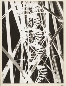 black and white photo close up of cables and beams of bridge by Moholy Nagy