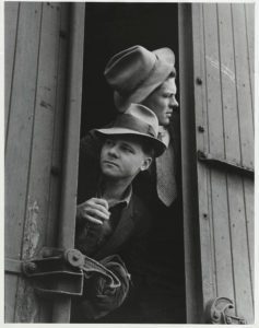 black and white fine art photo boys on the road maybe stowe aways on a train