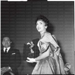 Gina Lollobrigida resumed after receiving the David di Donatello on stage at the Fiamma cinema in Rome.1956 - L159675