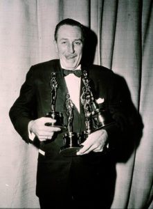 Walt Disney With Four Of His Statuettes. - X039758
