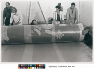 The Museum staff rolling the canvas 'Guernica' by Pablo Picasso (1937) for shipment to Spain, September 8, 1981. - 0132302