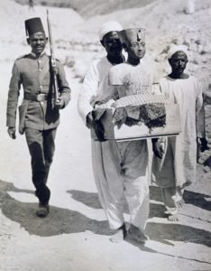 Bust of Tutankhamun being carried from his tomb, Valley of the Kings, Egypt, 1922 - H600078