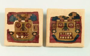 Tiwanaku Culture: two pieces of cloth representing human faces - Pre-Columbian art
