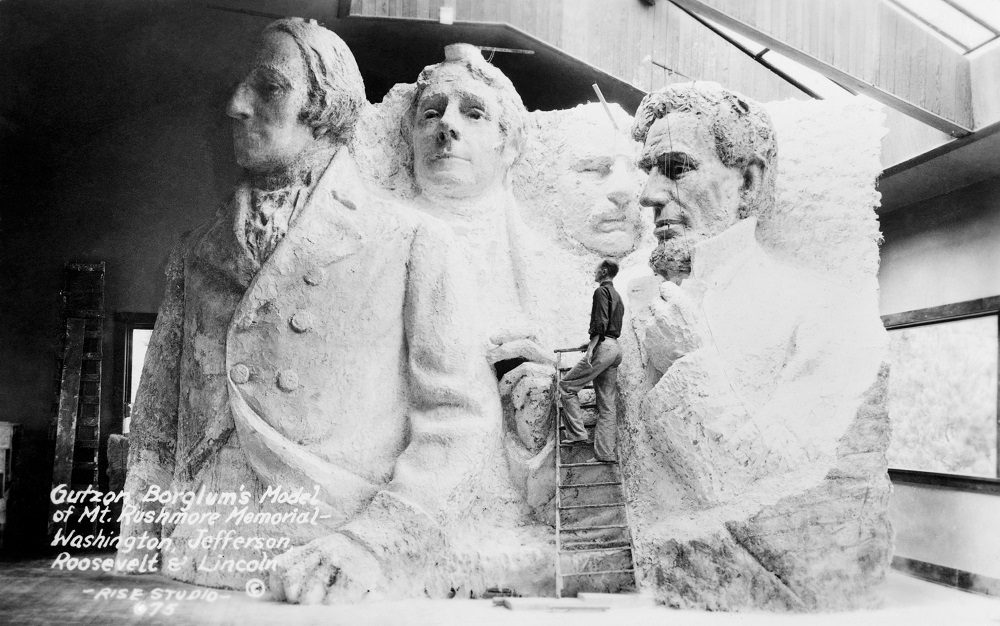 Gutzon Borglum's (1867-1941) model of Mount Rushmore National Memorial in a 1930s photograph. 